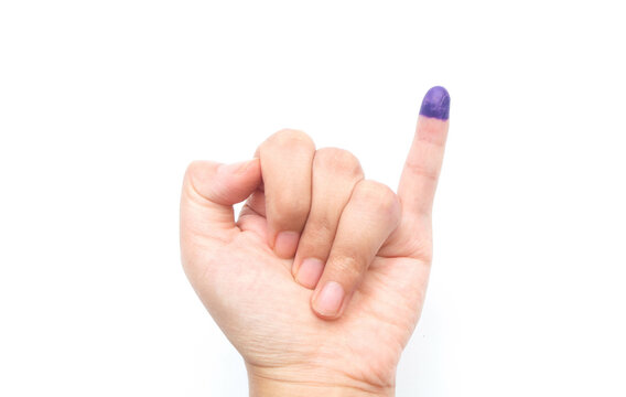 little finger with purple ink marks after the 2024 Indonesian presidential election on a white background