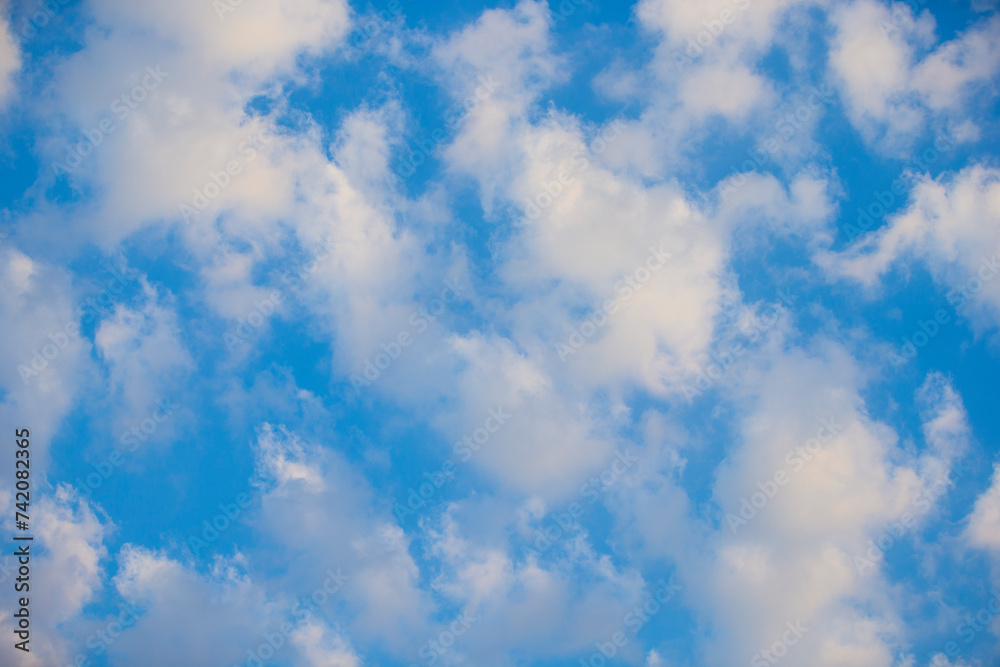 Canvas Prints sun rays through clouds in the blue sky. nature background. selective focus.