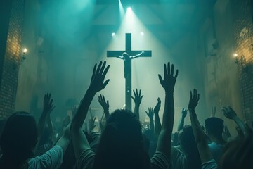 Christian worshipers raising hands up in the air in front of the cross