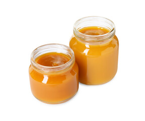 Baby food. Different healthy puree in jars isolated on white