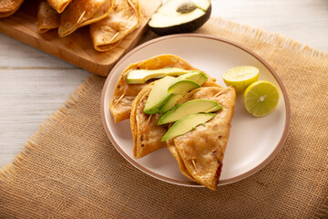 Pescadillas. So called when they are stuffed with fish such as tuna, popular during the Lent season. They are known as Golden Quesadillas when they are filled with ingredients such as meat or potatoes