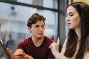 Business colleagues collaborating and discussing ideas for marketing strategy.