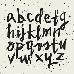 Vector handwritten calligraphic ink alphabet, black on white background. Hand drawn alphabet written with brush pen. Minuscula – small letters.