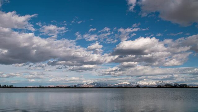 Timelapse of clouds moving over Gunnison Bend Reservoir  in Utah during winter.