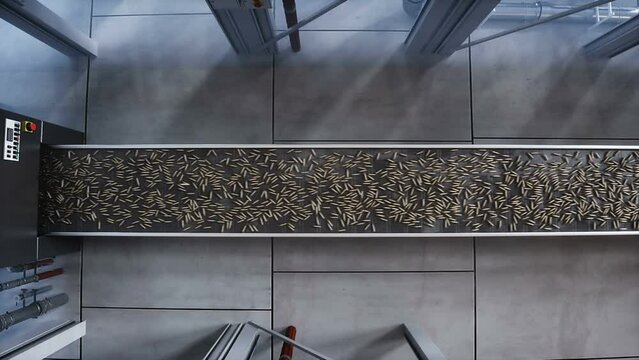 Bullet production, factory. Production line. War concept. Realistic 4k animation.