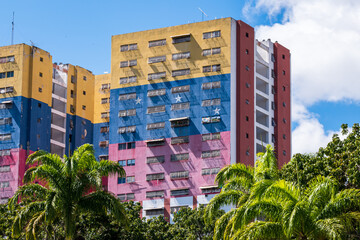 Caracas, Venezuela:  colorful buildings with the venezuelan flag along the "Paseo Los Próceres" (Walkway of the Heroes).