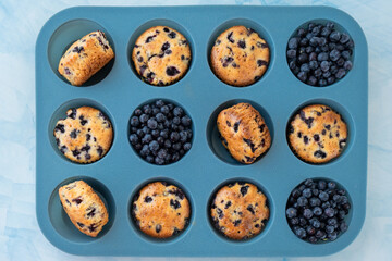 Berry pie in silicone muffin tin. Healthy vegan cupcakes with organic berries. Fresh baked...