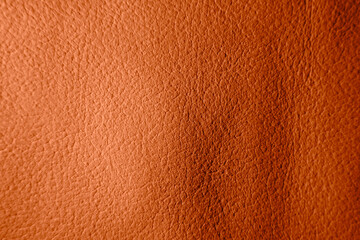 Abstract brown orange leather texture background.