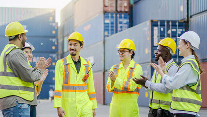 Diverse group of container workers Standing in line clapping hand Congratulations to the successful...