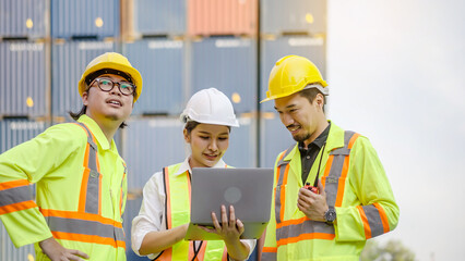 Group of professional dock worker and engineering people taking with their supervisor while record data online with digital laptop at warehouse logistic in cargo freight ship for import and export