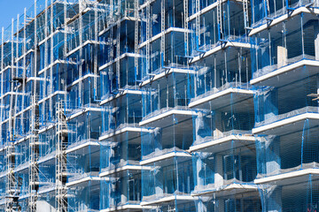 Facade of an apartment building under construction seen in Badalona, Spain