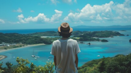 Man Overlooking Tropical Ocean View - obrazy, fototapety, plakaty