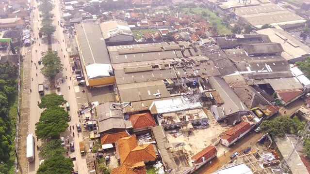 Aerial Footage. Damage to roofs and buildings in the Dwipapuri and Kahatex industrial areas due to tornadoes at Rancakek and the Sumedang border on 21/February/2024, Indonesia. Shot in 4k 30fps
