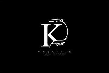 luxury white letter K logo design with beautiful flower and leaf ornaments. monogram K, logo typography. initials K. typography. for business logos, boutiques, companies, beauty, etc
