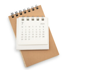 Simple desk calendar for JULY 2024 and blank memo isolated on white background. Calendar concept with copy space.