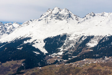 Ruchi mountain in the Glarus Alps, and village of Waltensburg/Vuorz in Graubünden, Switzerland