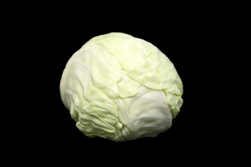 head of fresh green cabbage on a black background