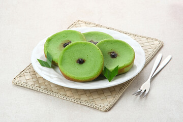 Kue Lumpur Pandan or Mud Cake, Indonesian traditional snack made from potatoes, pandan leaf, flour, eggs and coconut milk
