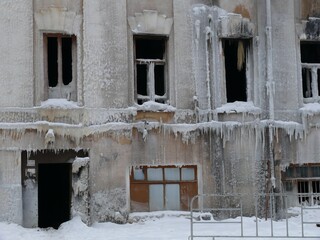 House facade after fire in winter everything frozen in Kazan, Russia.