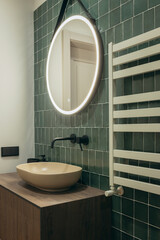 Modern green bathroom in house