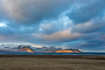 Kirkjufell mountain in a stormy winter day