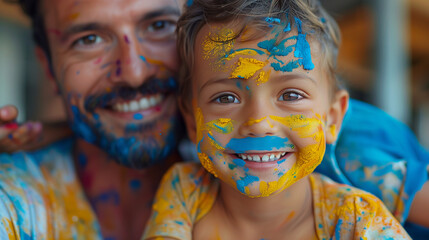 dad with kid, portrait of family with paint on their face celebrating Holi together in India, Holi Festival of color,  Holi celebration in Nepal or India