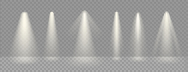 Spotlight illuminated stage background. White rays of floodlight, ies lamp beam set. Festive warm rays on transparent background