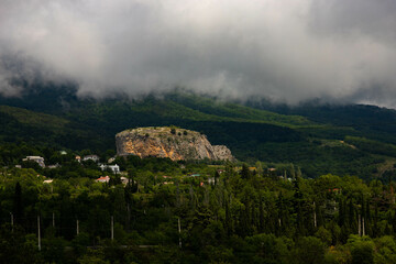 Red rock, cliff in the Gurzuf valley on the southern coast of the Crimea peninsula, located at an...