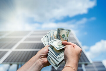engineer profits from solar stations, renewable energy from the sun - obrazy, fototapety, plakaty