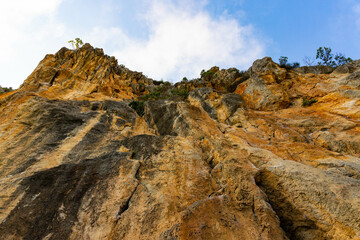 Red Red stone is a rock of pinkish-yellow marbled limestone.