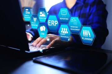 ERP Enterprise Resource Planning concept with businessman working on laptop computer to provide...