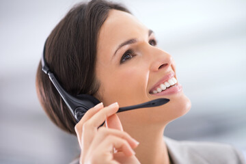 Call center, woman and smile with vision in office for customer service, communication and tech support. Agent, happy and headset with thinking for consulting, telemarketing or help for clients