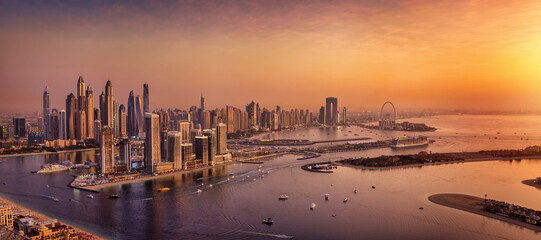 Elevated, panoramic sunset view of the modern Dubai Marina skyline, UAE