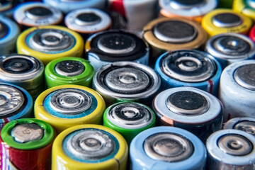 Group of used disposable drain batteries of various size