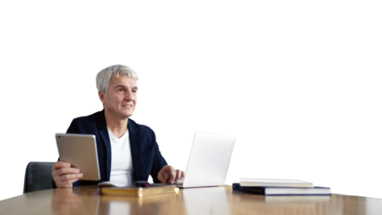 An elderly man, with graying hair, uses a laptop in the office of a worker.
