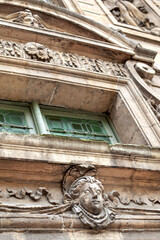 Details of the facade of an old mansion in the Marais district of Paris - 742524955