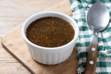 Green Chimichurri Sauce on wooden table