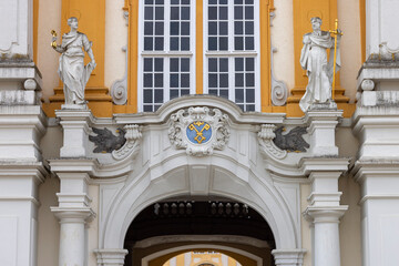 Melk Abbey on hill above town, decorative portal with Melk Abbey coat of arms, Melk, Austria