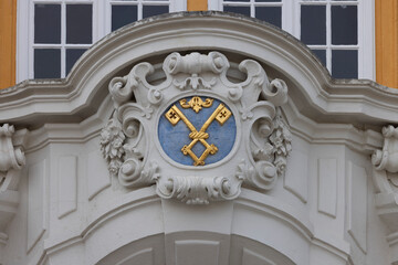 Melk Abbey on hill above town, decorative portal with Melk Abbey coat of arms, Melk, Austria