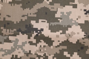 Texture of camouflage fabric as background, top view