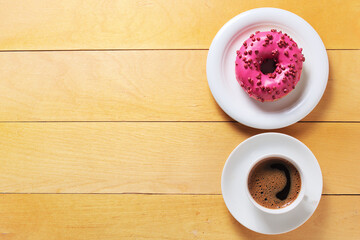 Pink donut and coffee