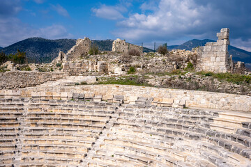 The remains of an Opramoas monument, aqueduct, a small theater, a temple of Asclepius, sarcophagi, and churches from Rhodiapolis, which was a city in ancient Lycia. Today it is located in Kumluca