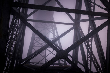 Iron structures of the The Dom Luis I Bridge in thick fog, Porto, Portugal. - 742562129
