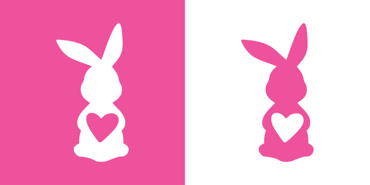 Logo con silueta de Conejo de Pascua con corazón. Silueta de Conejito de Pascua de pie