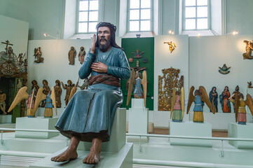 Perm wooden sculpture. A god carved out of wood. Ancient sculptures in the church. The figure of...