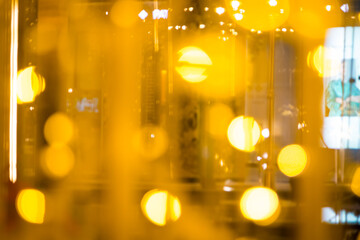 close-up blurred photo Golden decorative lights create a luxurious atmosphere at night events....