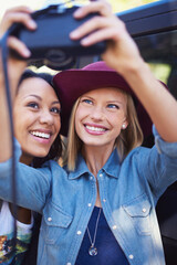 Women, friends and selfie photo with a camera on a holiday outside for a road trip. Photography,...