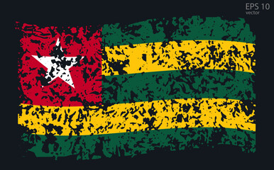 Vector flag of Togo. Vector illustration with cracks and abrasions.
