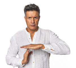 Middle-aged Latino man showing a timeout gesture.