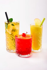 Three cocktails on a white background